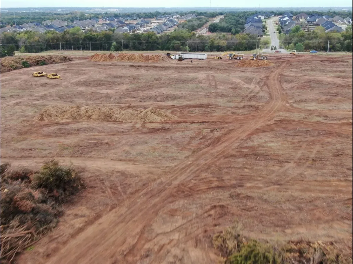 Cleared lot with brush and debris removed