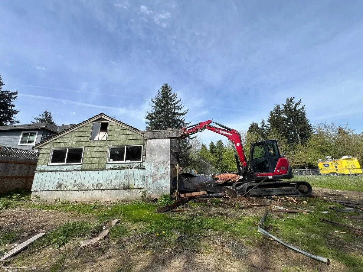 Small garage structure coming down during demolition