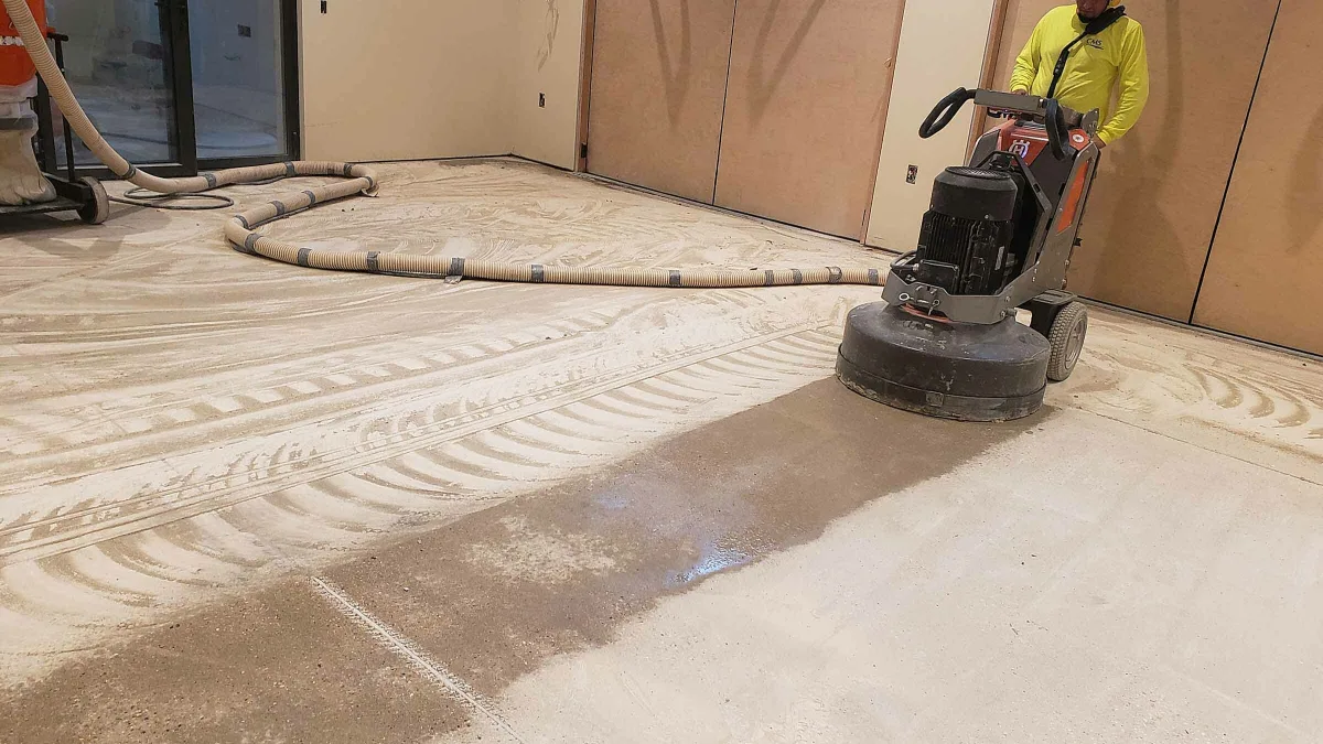 Concrete floor after flooring removal and surface preparation